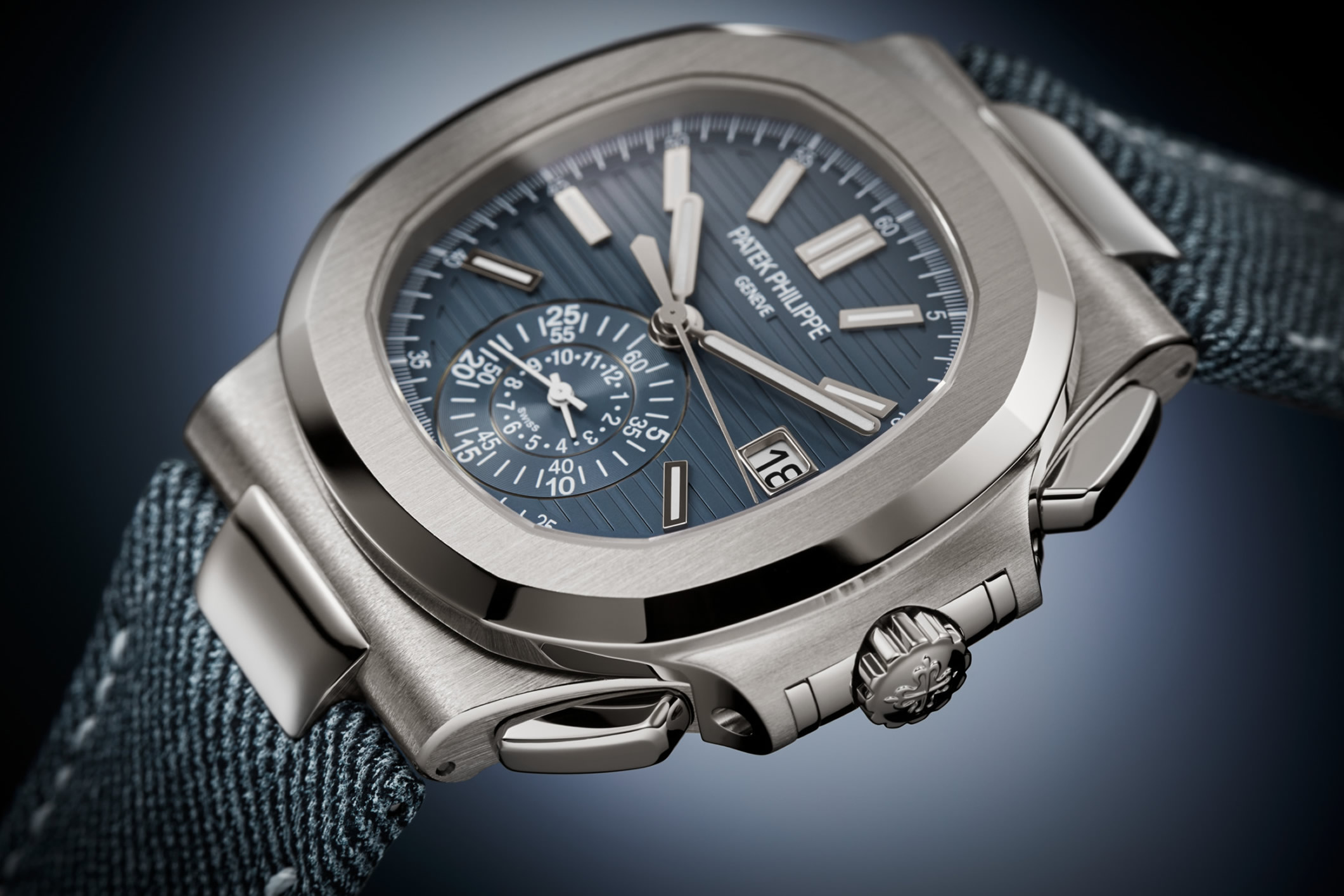 Nautilus flyback chronograph watch in white gold with blue-grey dial and straps