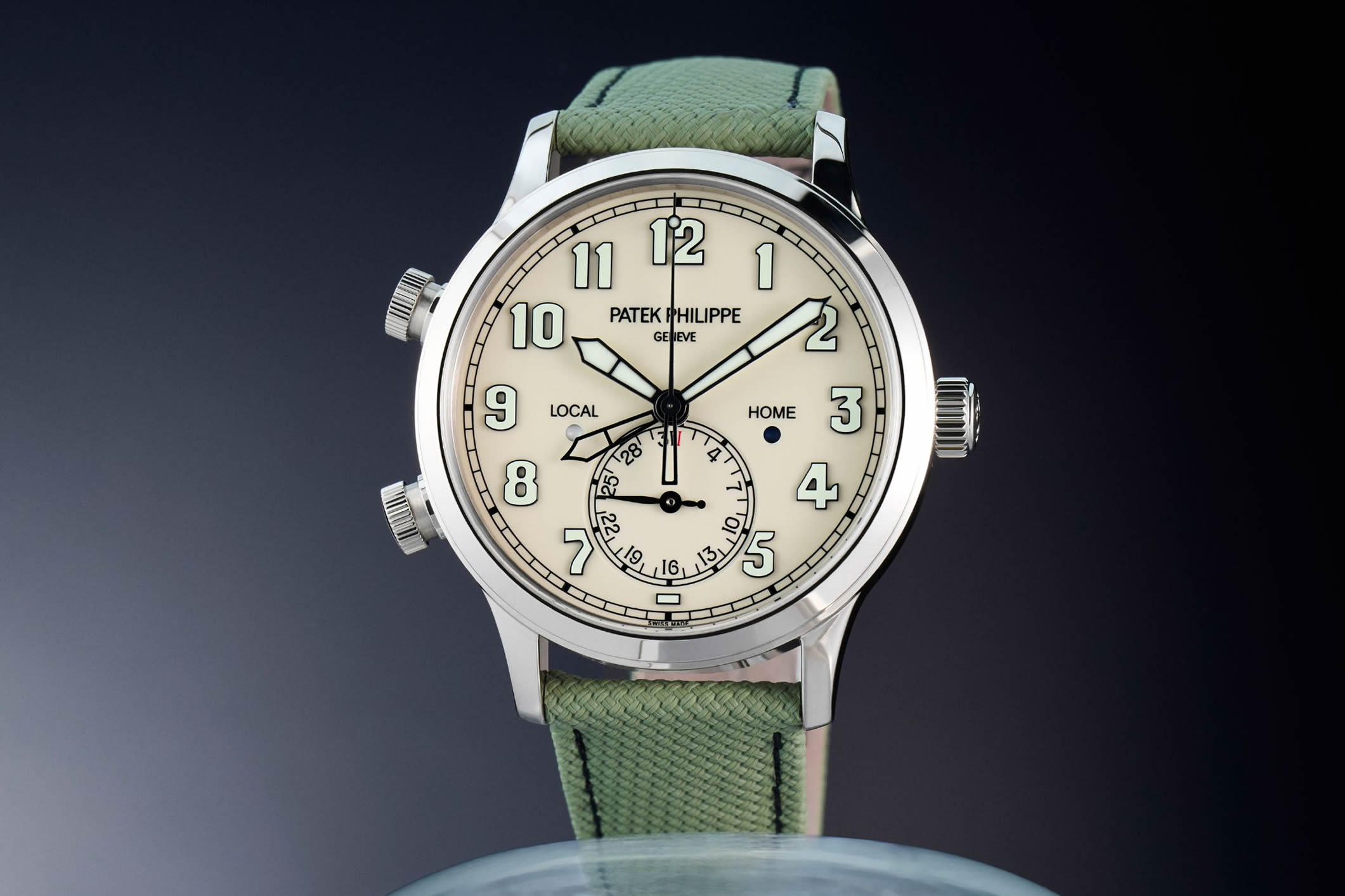 Patek Philippe Calatrava Pilot Travel Time 5524G-010 in white gold with ivory dial and khaki green strap
