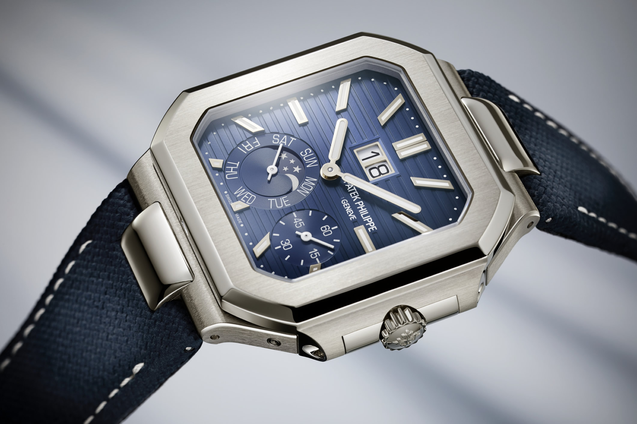 Patek Philippe Cubitus watch, reference 5822P-001 with a sunburst blue dial and white gold baton-style markers with luminescent coating