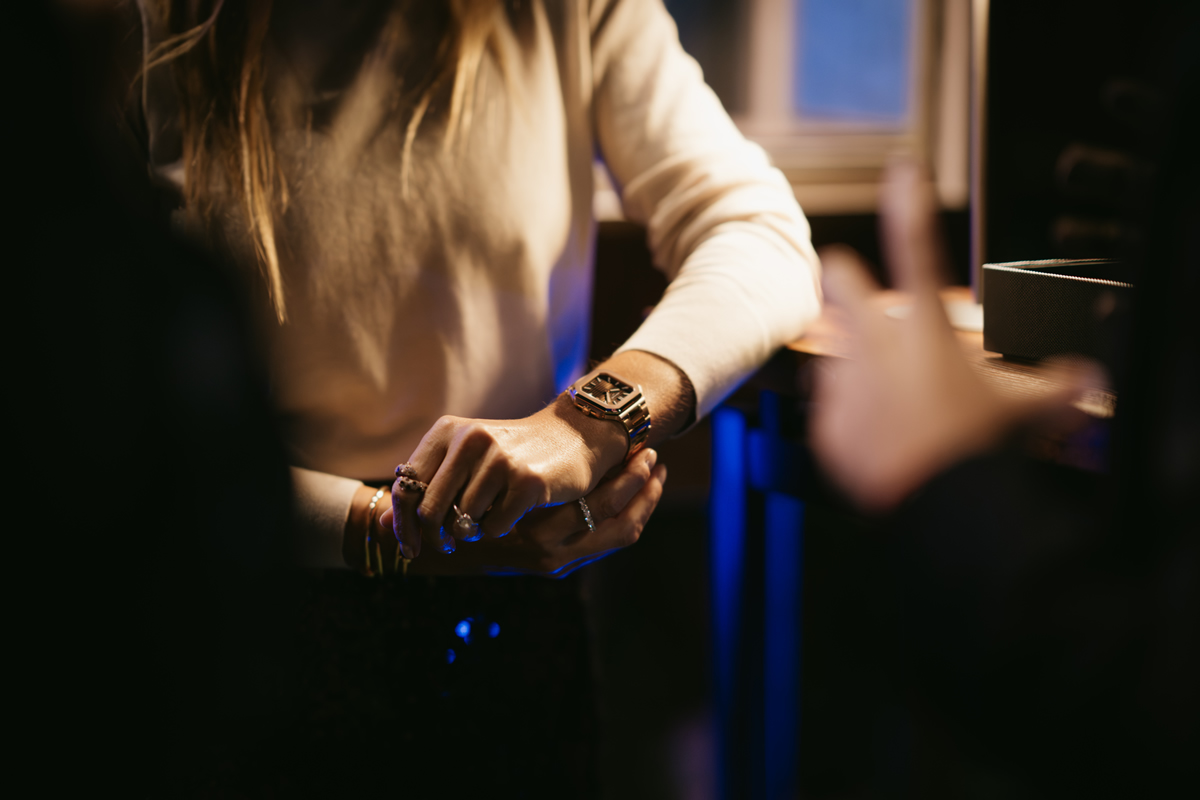 A guest tries on the new reference 71281R-001, from the Patek Philippe Cubitus collection, at the Relojería Alemana event in Palma