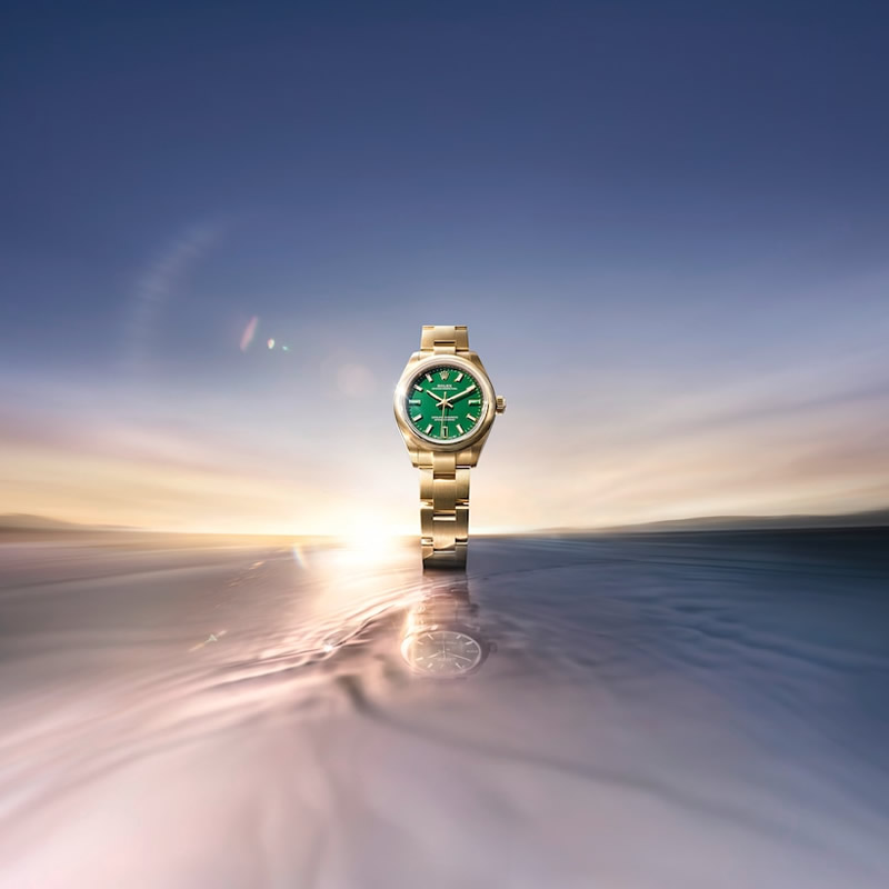 Rolex Oyster Perpetual 28 oro amarillo esfera verde