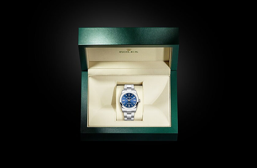 Case Rolex watch Oyster Perpetual 34 Oystersteel and Bright blue dial Relojería Alemana