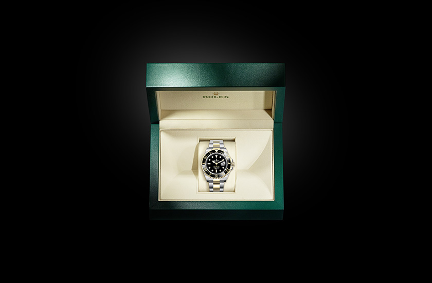 Estuche reloj Rolex Sea-Dweller de acero Oystersteel, oro amarillo y esfera negra en Relojería Alemana