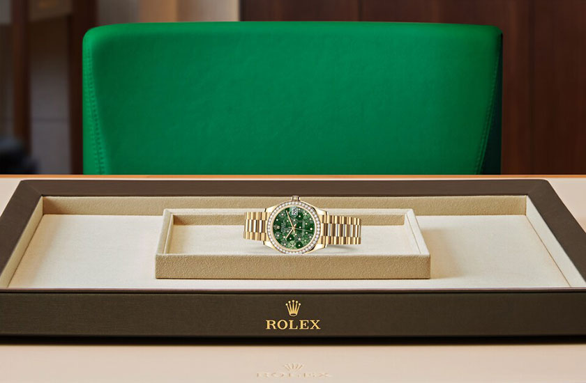 Reloj Rolex Datejust 31  de oro amarillo y diamantes y esfera verde oliva, motivo floral, engastada de diamantes  watchdesk en Relojería Alemana