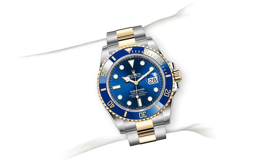 Simulation wrist Rolex Submariner Date Oystersteel, yellow gold and royal blue dial in Relojería Alemana