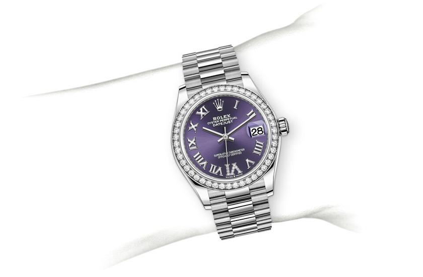 Simulation wrist Rolex Datejust 31de  white gold and diamonds and  Aubergine dial set with diamonds in Relojería Alemana